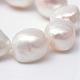 Hebras de perlas ovaladas de agua dulce cultivadas naturales PEAR-R015-32-3