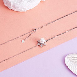 Collier lariat anti-ternissement avec pendentif en forme de flocon de neige de Noël et pompon en perles&nbsp;JN1055A