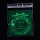 レクタングルクリスマスモチーフセロハンのOPP袋  花輪模様付き  濃い緑  14x9.9cm  一方的な厚さ：0.035mm  インナー対策：11x9.9のCM  約95~100個/袋 OPC-L001-34D-2