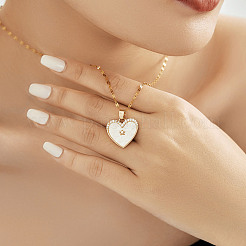 Colliers élégants et à la mode en laiton micro pavé avec zircone cubique transparente et brillante pour un usage quotidien&nbsp;HK4555-1