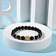 Bracelets extensibles perlés tête de bouddha en pierre noire synthétique et alliage BJEW-JB09420-02-4