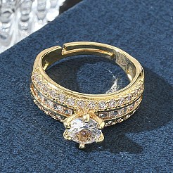 Anillos ajustables de latón con circonita cúbica redonda central y detalles de circonita baguette para mujer.&nbsp;CU-CBA7E55-16G