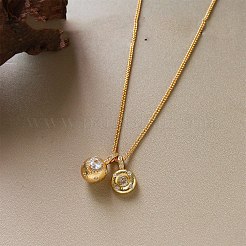 Collana da donna con doppio pendente a sfera rotonda in ottone con pavé di zirconi cubici trasparenti.&nbsp;WG4A742-01