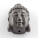 Perline di corallo tinto Buddha head sintetico CORA-R011-15-2