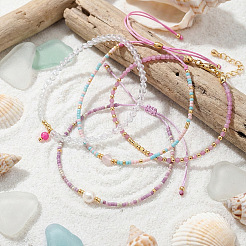 Ensemble de 4 bracelet ajustable en perles de verre et pierres précieuses naturelles (4 styles différents) et bracelets à breloques rondes en perles de verre pour femmes.&nbsp;EV4256-1