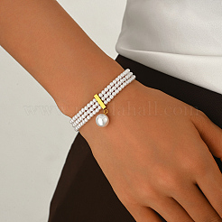 Pulseras multihilo con dije redondo de perla natural de agua dulce y cadena final de acero inoxidable.&nbsp;UK4868