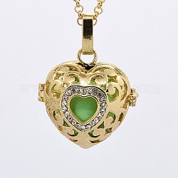 Golden Brass Rhinestone Cage Pendants, Chime Ball Pendants, Heart, with Brass Spray Painted Bell Beads, Light Green, 27x27x21mm, Hole: 3x5mm, Bell: 16mm