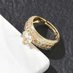 Anillos ajustables de latón con circonita cúbica redonda central y detalles de circonita baguette para mujer.&nbsp;CU-CBA7E55-16G