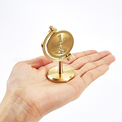 Schreibtischornament aus Messing mit Globus und der Gravur „einhundert Millionen“.&nbsp;DJEW-WH0043-120