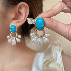 Серьги-гвоздики из пластикового сплава с овальным жемчугом и веером&nbsp;FS-WG2B252-01