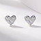 Delicate minimalist heart-shaped silver earrings for women's daily wear and dating.