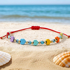 Браслеты из синтетического бирюзового сердца и стеклянного оберега от сглаза.&nbsp;IQ8070