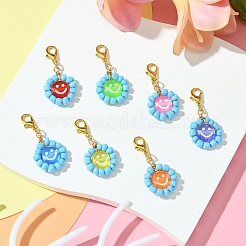 Плоская круглая с улыбающимся лицом стеклянная подвеска в виде семени&nbsp;HJEW-MZ00092